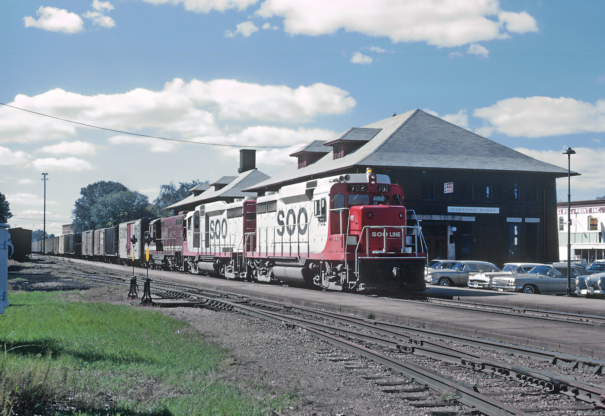A pair of Soo Line GP30's, just over a year old, lead their freight pa...
