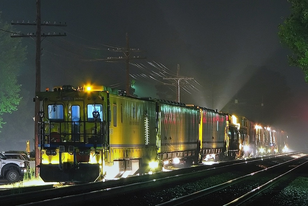 Image result for photo of rail grinders working at night with sparks flying