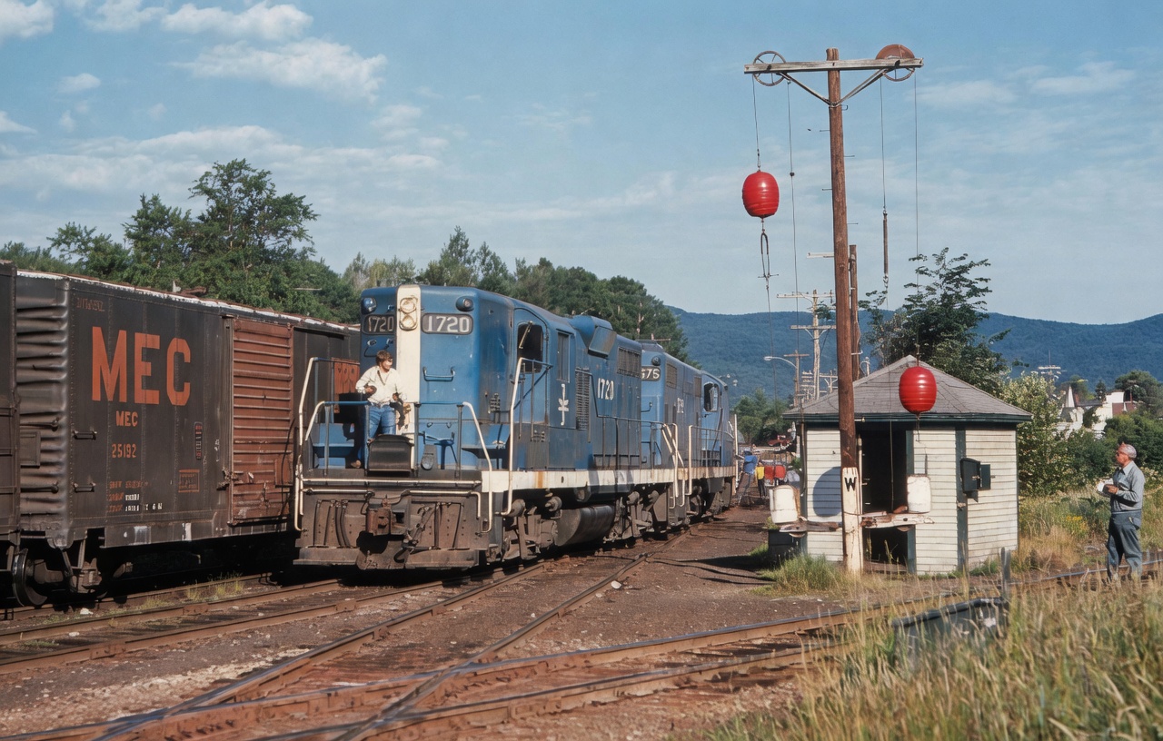 Boston and Maine GP9 1720 and GP7 1575 at the Whitefield New Hampshire ball signal July 22 1976