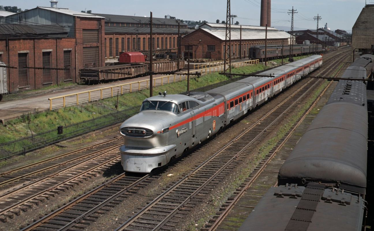 The Aerotrain westbound at Altoona Pennsylvania passing under the tell-tales for the Seventh Street Bridge on July 18 1956