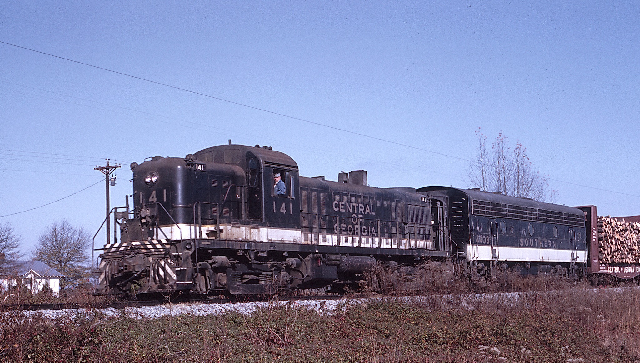 Central of Georgia RS3 No. 141 ahead of a way freight near Farmington, Georgia, on November 25, 1967
