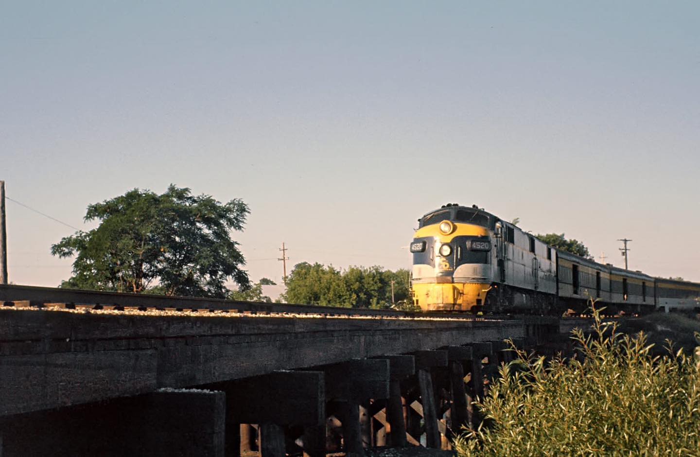 Chesapeake and Ohio E7A 4520 ahead of train 26 departing Traverse City Michigan for Grand Rapids in August 1962