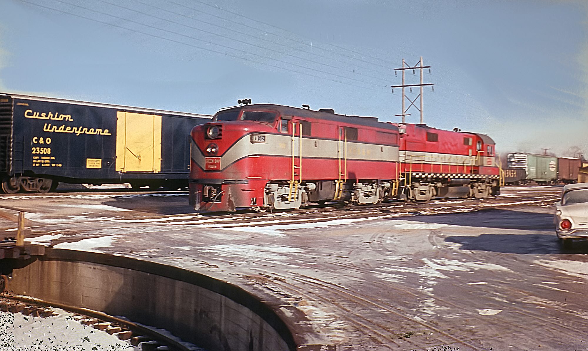Kewaunee, Green Bay and Western FA-1 502 and Green Bay and Western RS27 310 at Wisconsin Rapids in January 1964