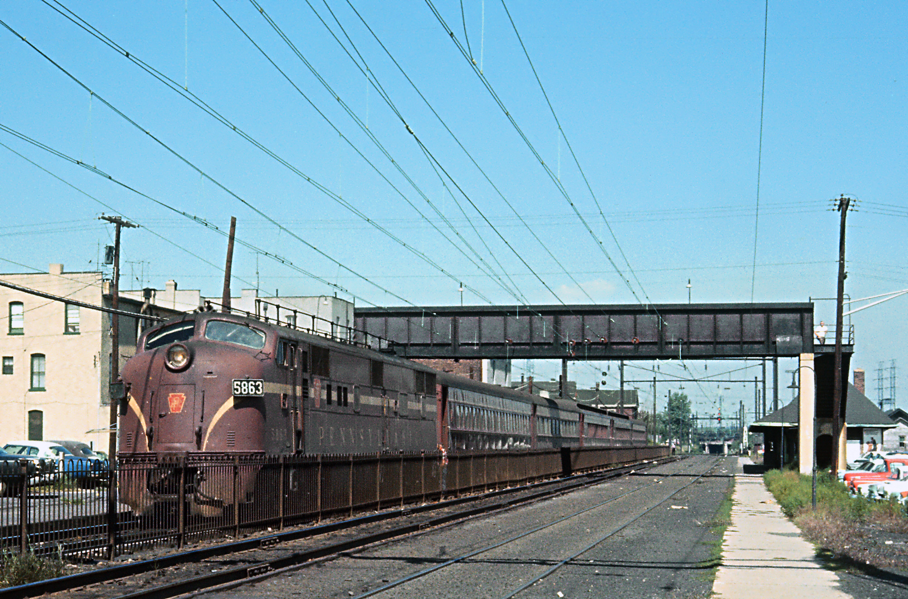 Pennsylvania E7A 5863 stopped under the wires at South Amboy New Jersey with commuter train 111 on September 3 1965
