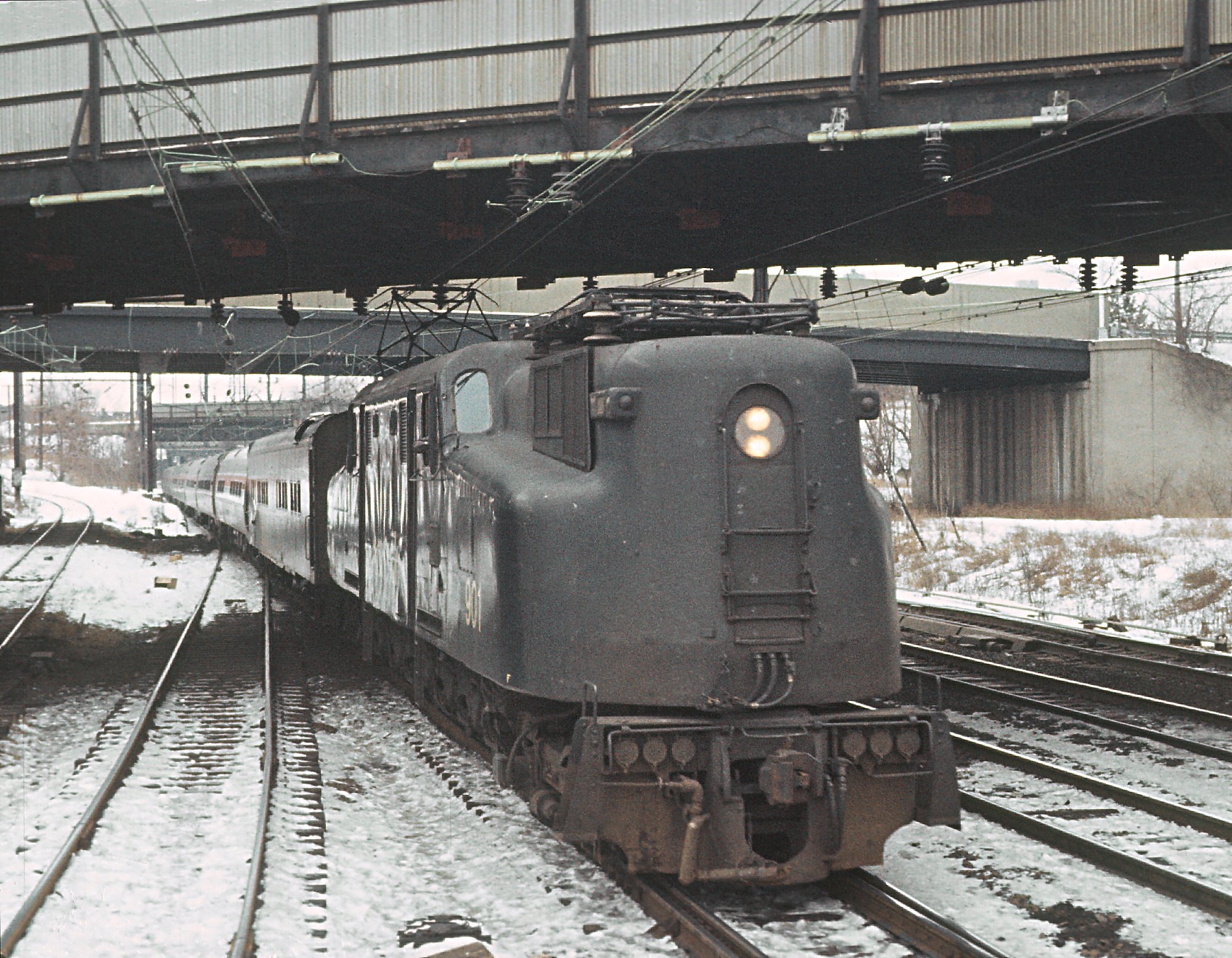 Another view of Amtrak GG1 901 with trains 174 and 142 at Trenton, New Jersey, January 28, 1977