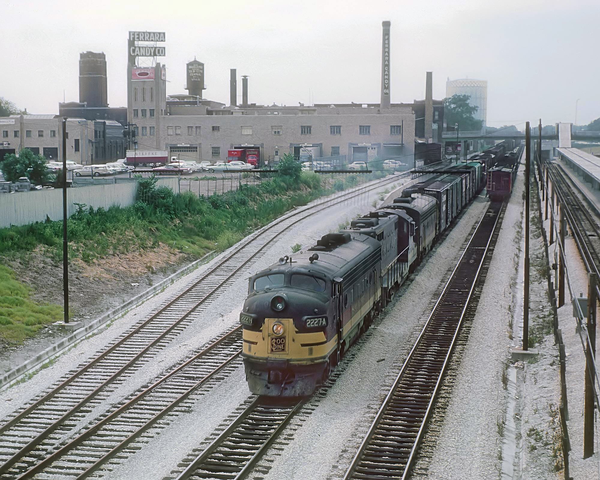 Soo Line F7A 2227-A leads an eastbound freight at Harlem Avenue in Forest Park, Illinois, in July 1962
