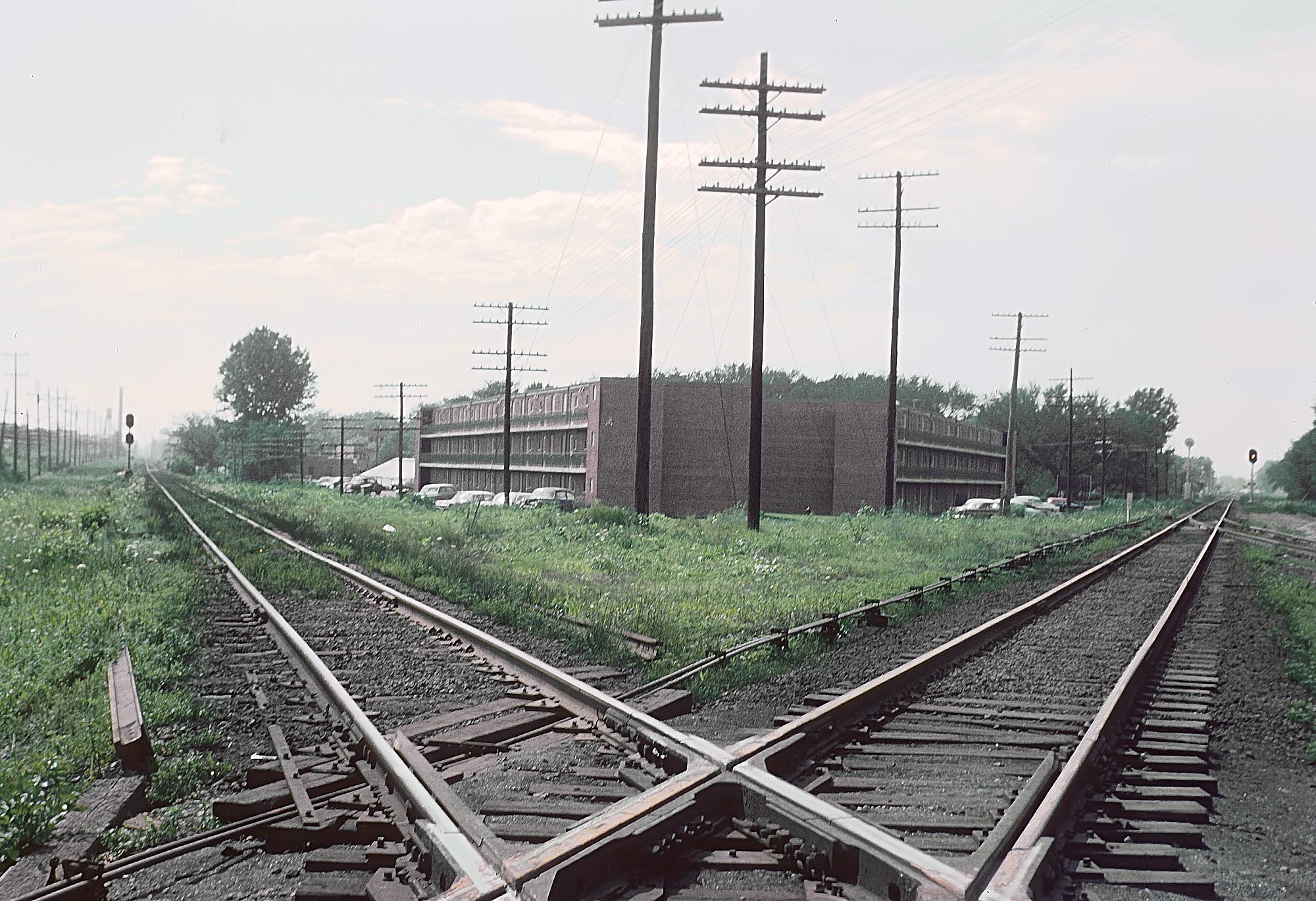 Chicago Great Western at left and Chicago and North Western at right diamond at Elmhurst Illinois July 1962 abandoned CA&E at far left