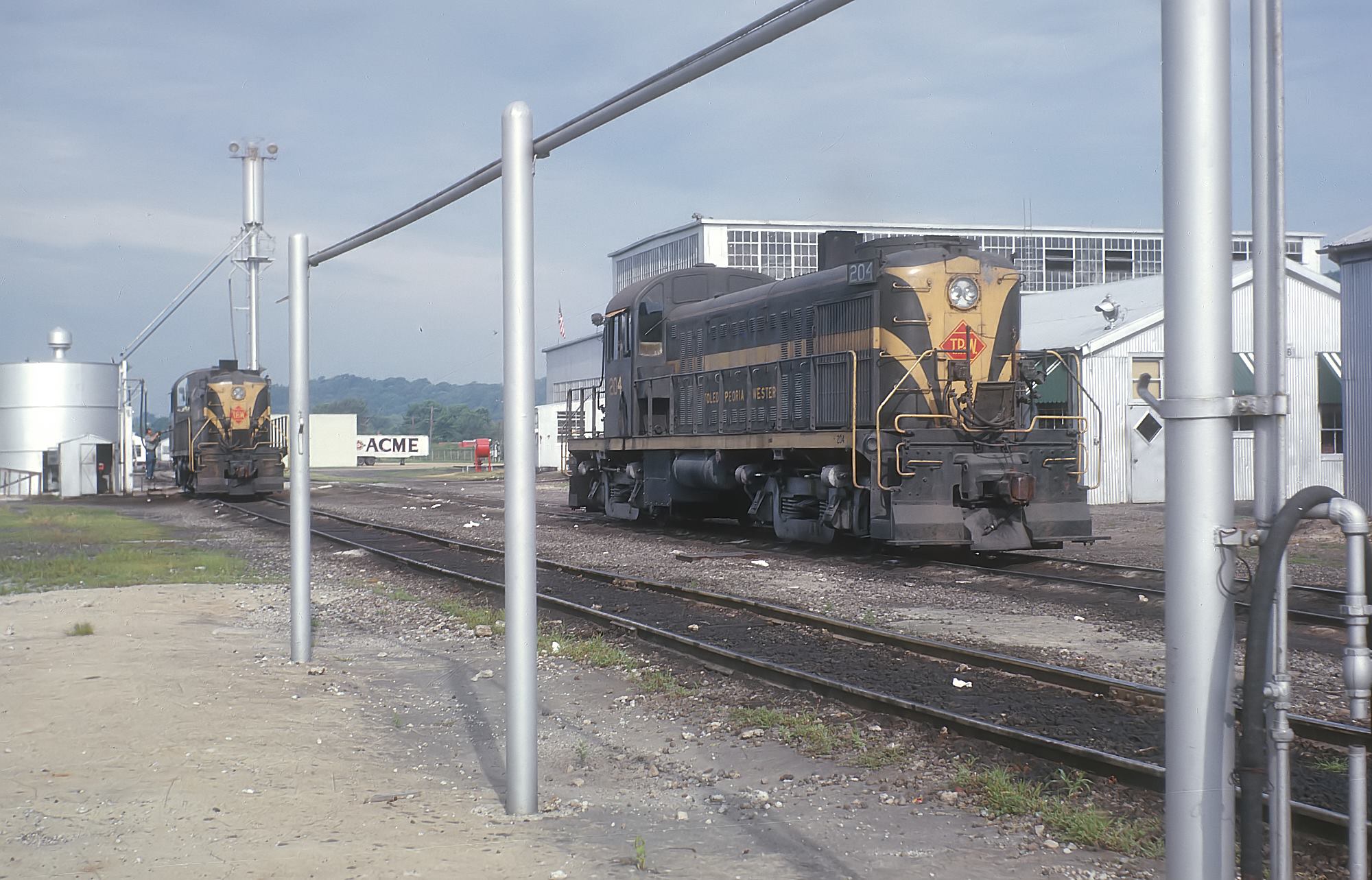 Toledo, Peoria and Western RS2s at the East Peoria shops in July 1963, with 204 closest to the camera
