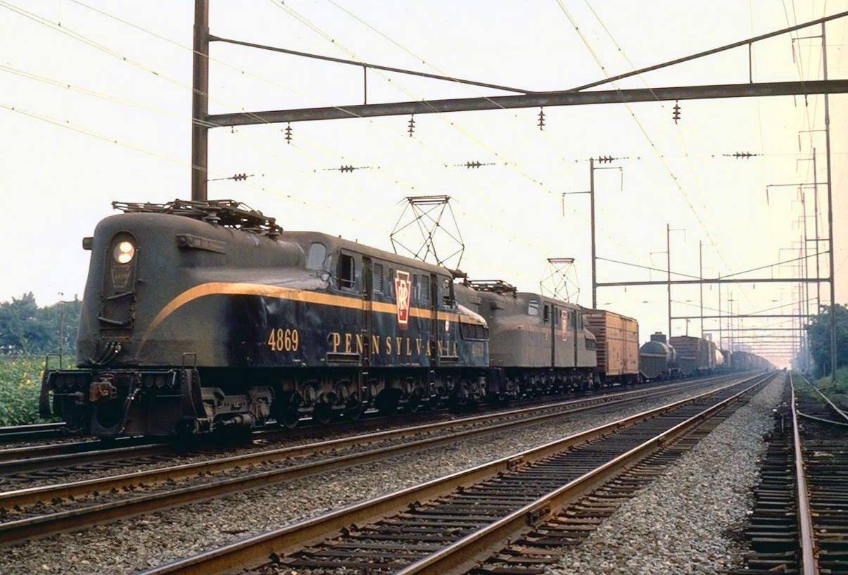 A pair of former Pennsylvania GG1s on a Penn Central freight near Morrisville, Pennsylvania, August 24, 1968