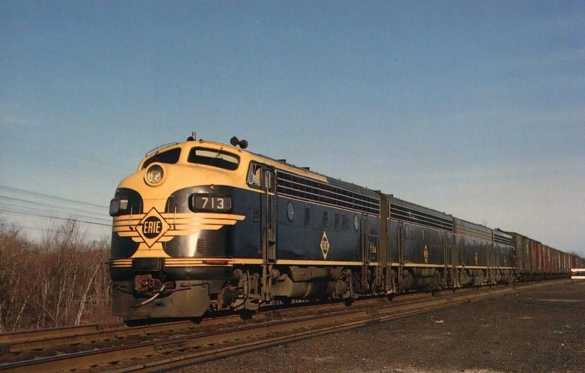An A-B-B-A lashup of Erie covered wagons led by F7A 713-A with a merchandise freight at the Maybrook New York interchange circa 1955