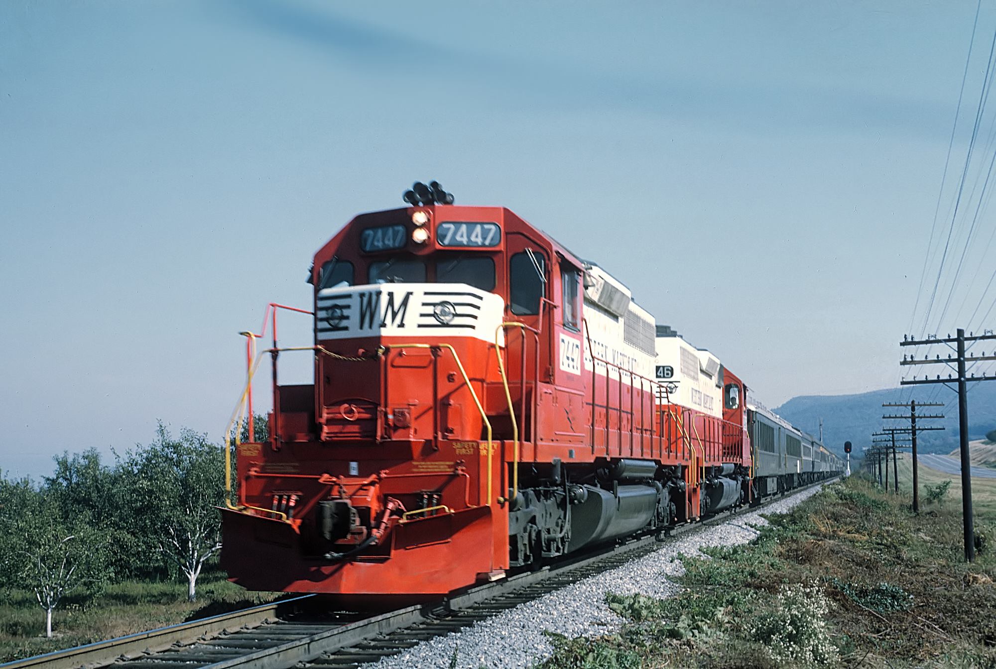 Two new Western Maryland SD40s in Circus paint on an NRHS fan trip near Smithsburg Maryland on October 11 1969