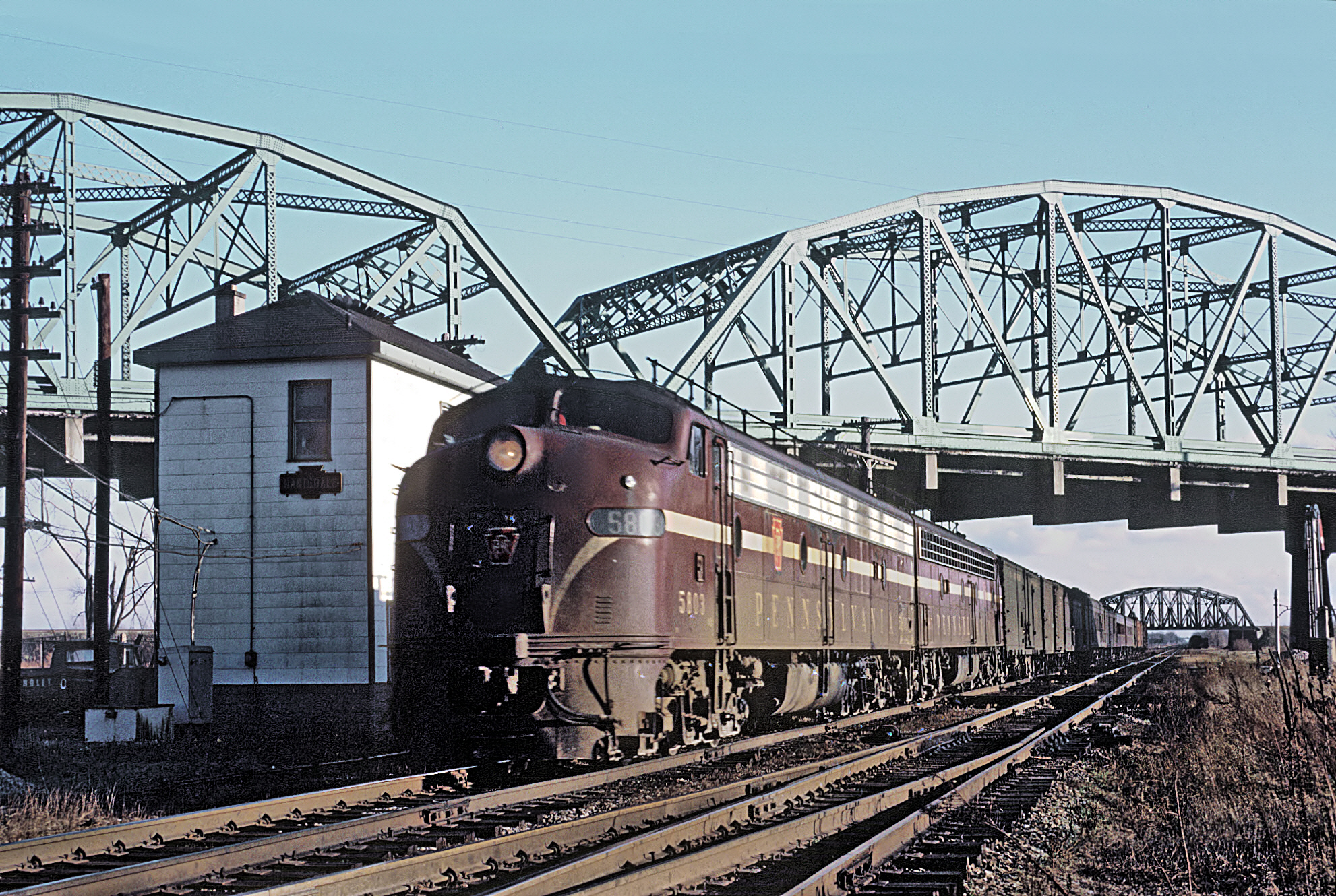 Pennsylvania Railroad E8As led by 5803 on the Red Bird at Hartsdale Indiana on November 26 1965
