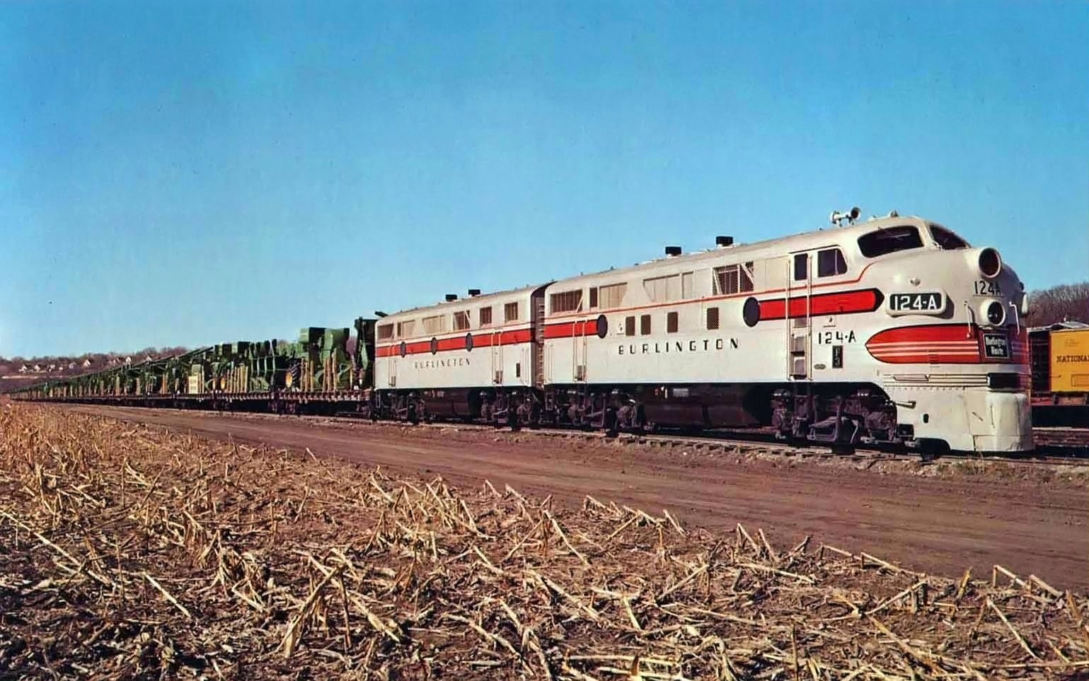 New Burlington F3s 124-A and 124-B with John Deere farm equipment, circa 1948