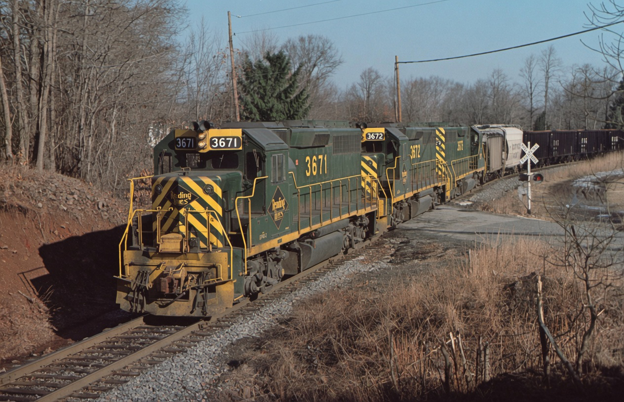 Reading GP40-2 3671 leading empties for the Grace Mine at Elverson Pennsylvania on February 19 1976