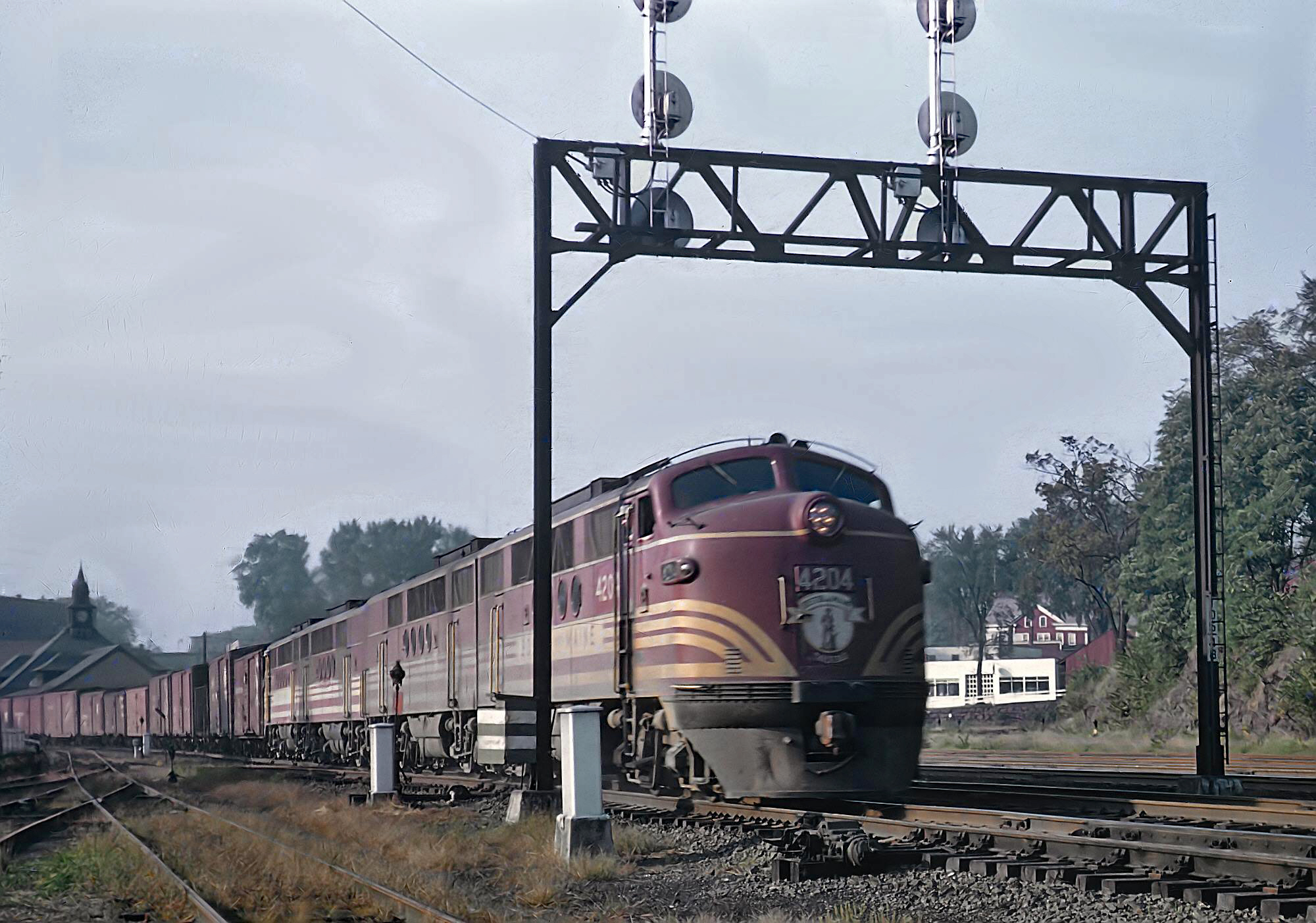 A group of Boston and Maine FTs led by 4204 with a freight through Greenfield Massachusetts September 18 1955