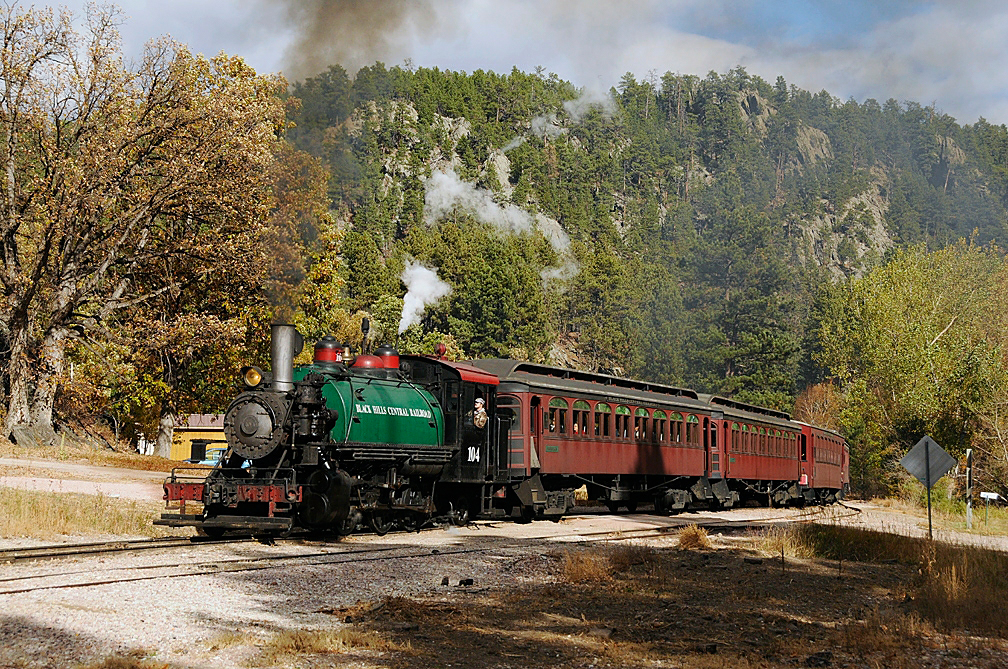 1880 Train steam locomotive in Black Hills autumn scenery