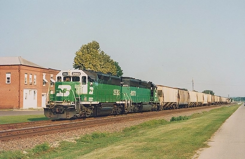 Burlington Northern GP35m 2983 and SD40-2 8070 westbound local at Cassville Wisconsin August 24 1991