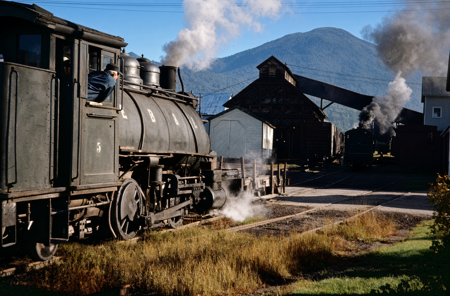 East Branch and Lincoln Railroad 2-4-2T 5 works the mill in Lincoln New Hampshire mid-1940s with 0-4-0T 3 in the background Philip Hastings