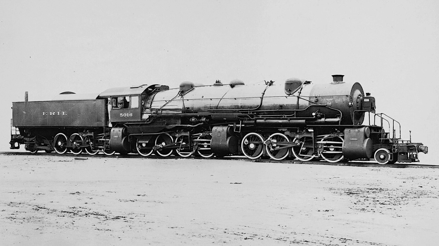 Baldwin builder photograph of Erie 2-8-8-8-2 Triplex 5016, with the third engine under the tender