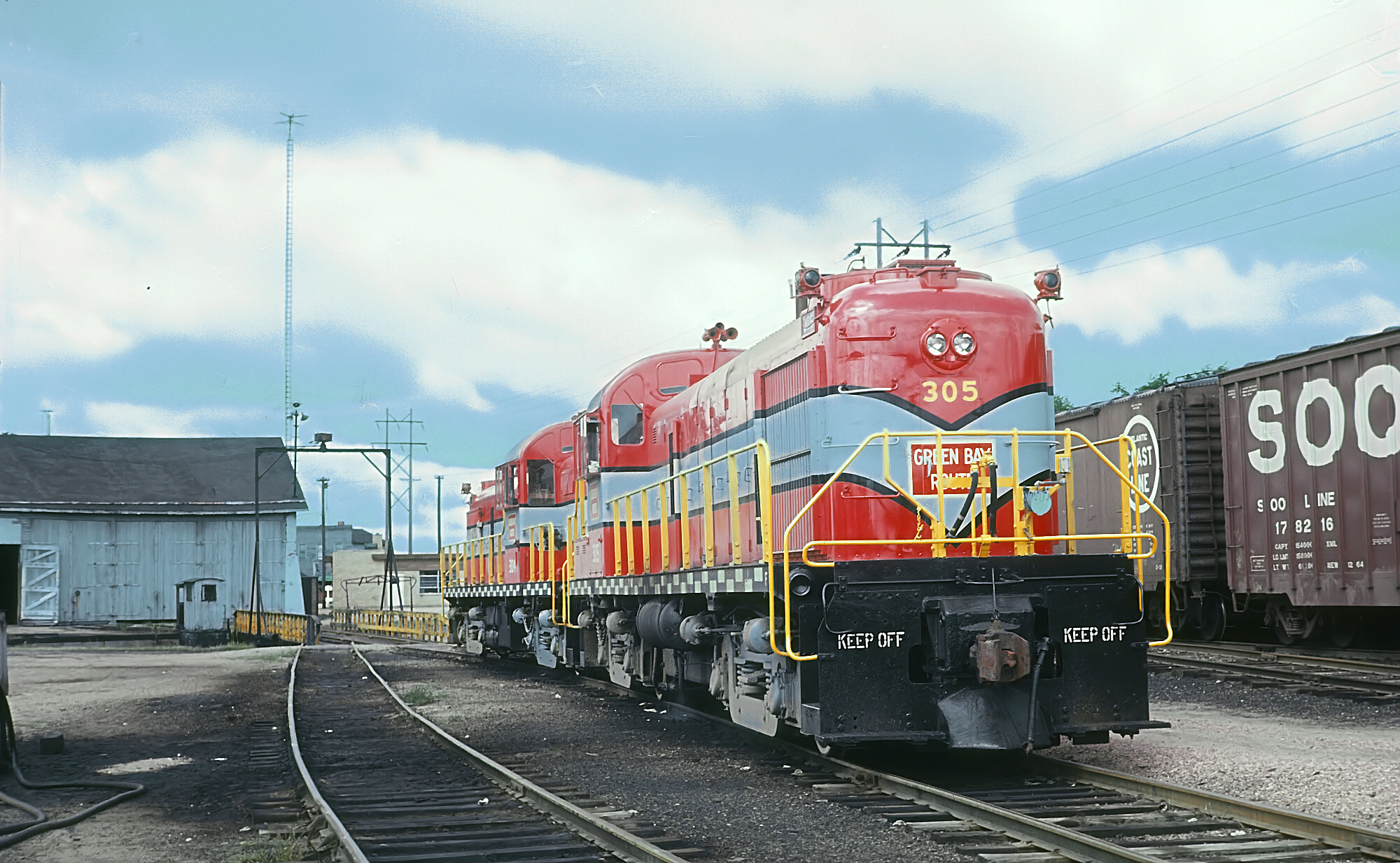 Green Bay and Western RS3 305 and RS2 304 at Wisconsin Rapids on August 23, 1966