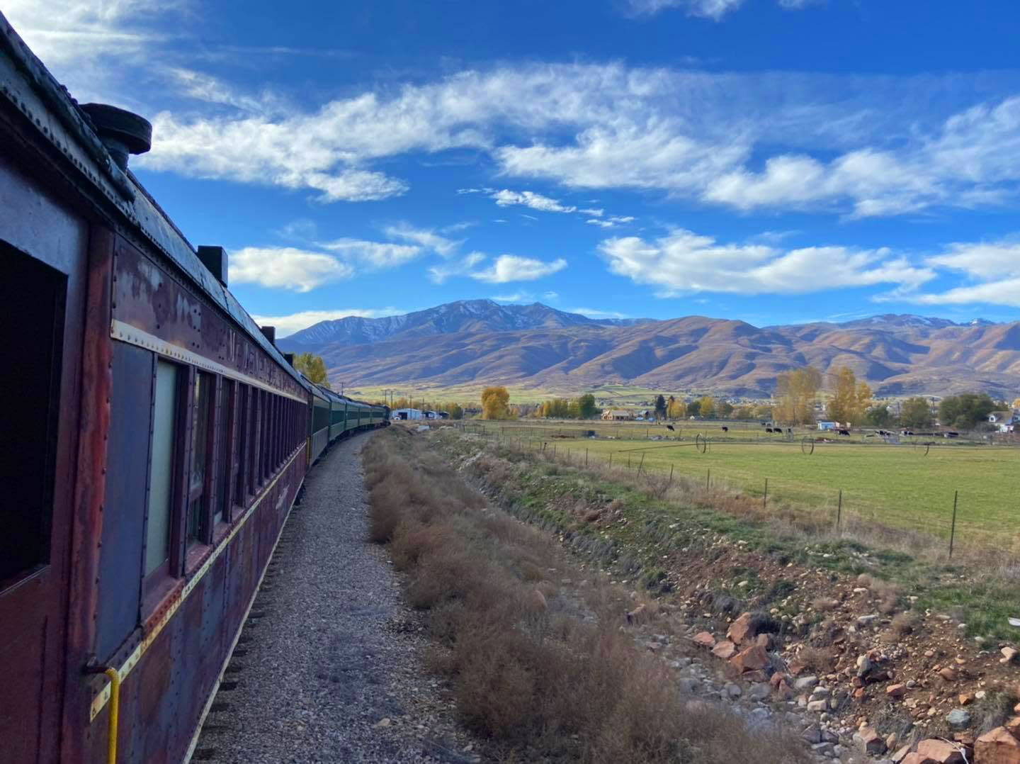 Heber Valley Railroad train with Wasatch fall colors near Deer Creek Reservoir