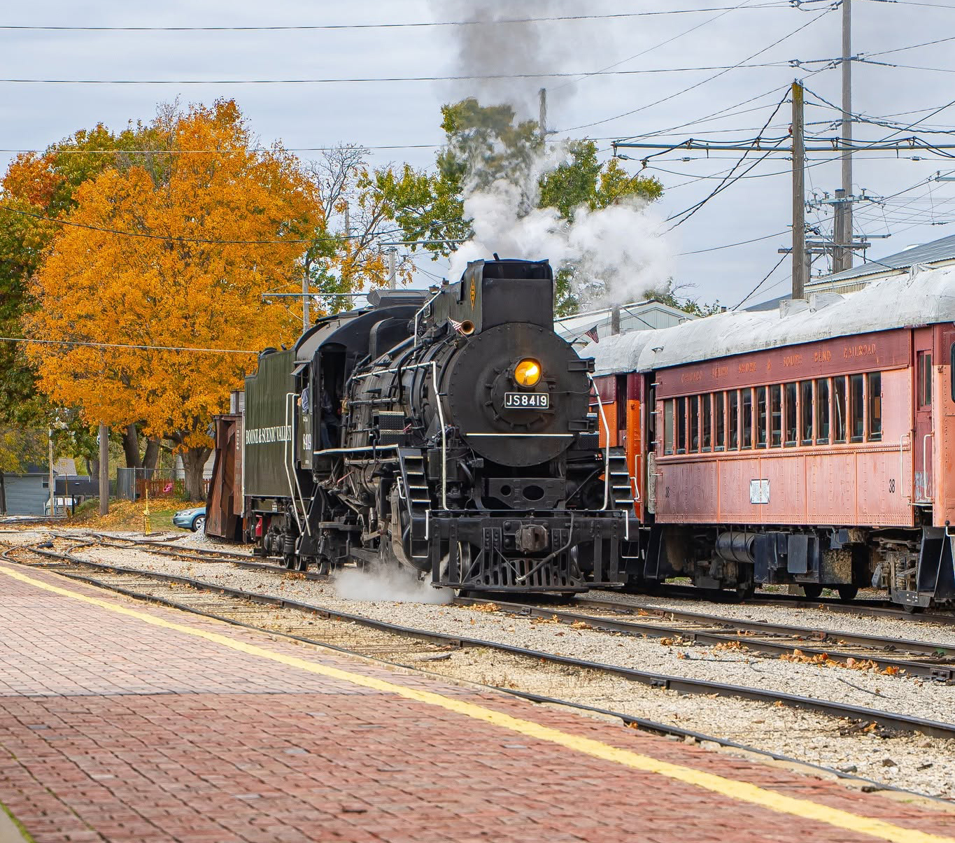 Boone and Scenic Valley Railroad 2-8-2 8419 in the fall colors at Boone, IA